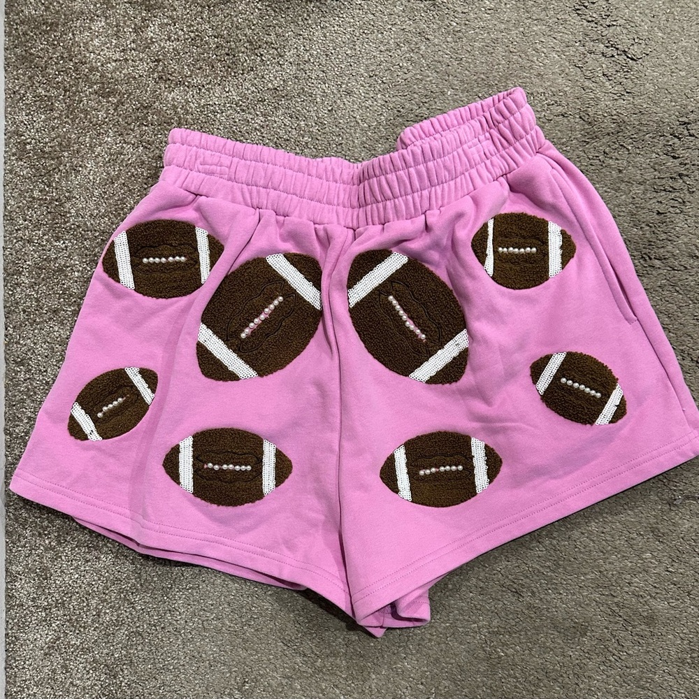 QUEEN OF SPARKLES Pink Football Shorts